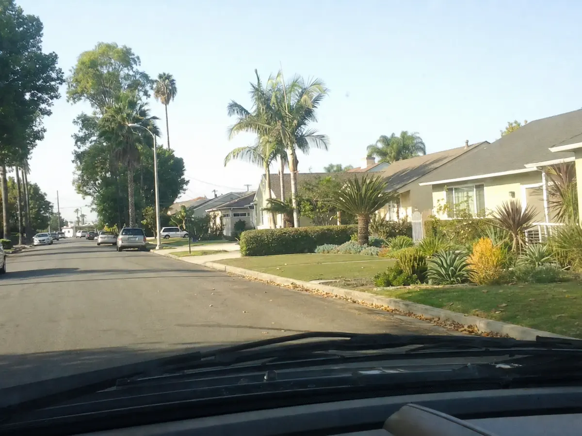 Service van arriving on a Burbank, CA street — local same-day coverage